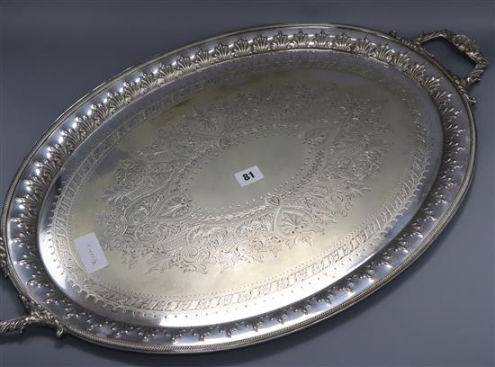 A late Victorian plated engraved two handled tea tray length 73cm